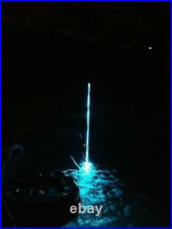 Water Jet Laminar Color LED Light stays inside a stream of water pool pond
